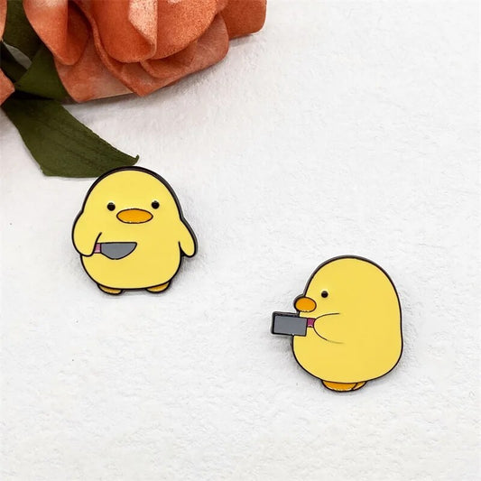 Fun Cartoon Yellow Duck Holding A Knife Enamel Lapel Pin - Creative Personality Gift for Friends